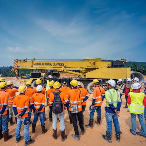 Group of Construction Workers and Equipment